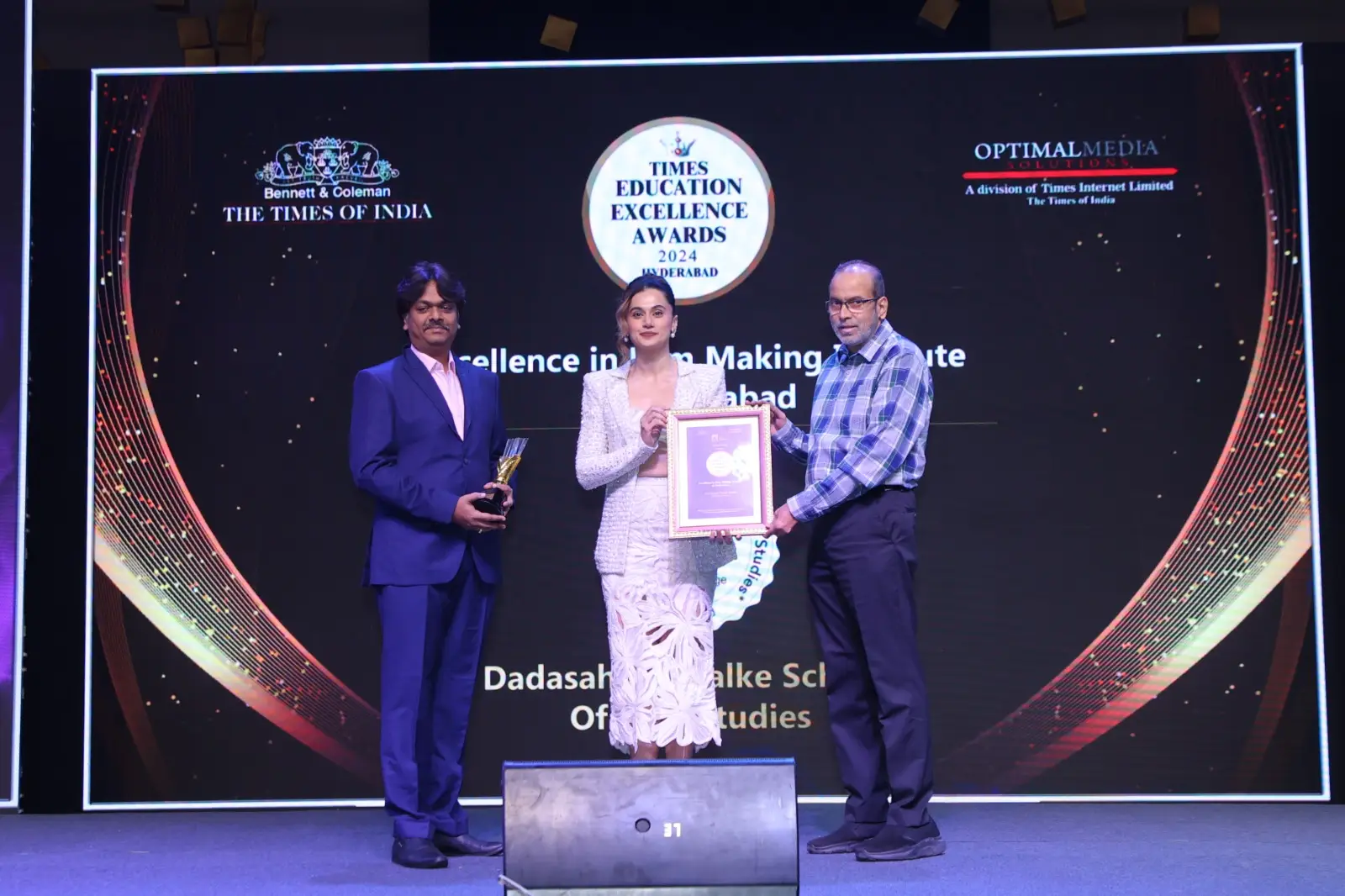 Taapsee Pannu awarding Best Film School in Hyderabad award of Times group to Dadasaheb Phalke School of Film Studies